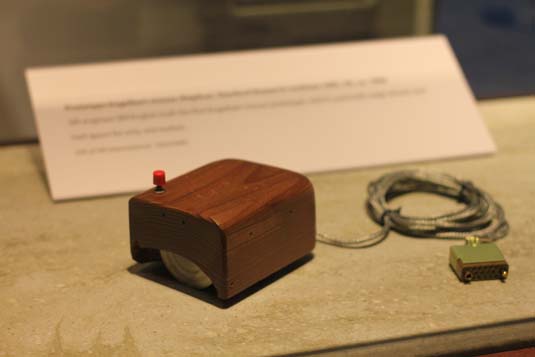The first prototype computer mouse, developed by Bill English and famously used by Douglas Engelbart in "The Mother of All Demos", a demonstration of the oN-Line System in 1968. Courtesy of apple2history.org. Uploaded by Michael Hicks as File:Douglas Engelbart's prototype mouse, angled - Computer History Museum.jpg License:Creative Commons Attribution 2.0 Generic